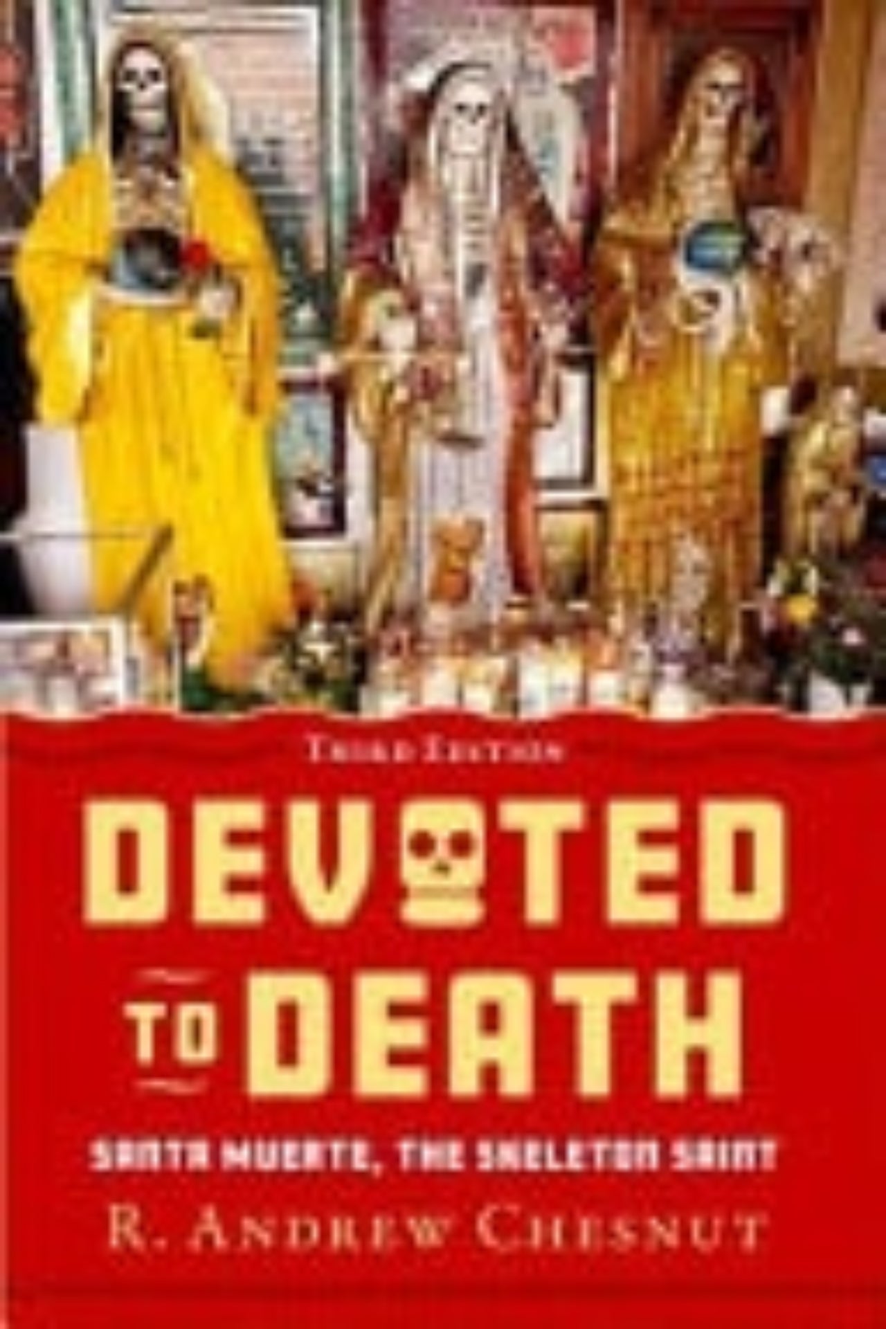 Book cover of 'Devoted to Death' with statues and text