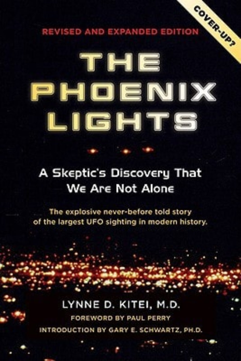 Book cover of 'The Phoenix Lights' with a dark background and city lights.