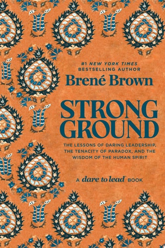 Book cover of 'Strong Ground' by Brené Brown with decorative patterns on an orange background.