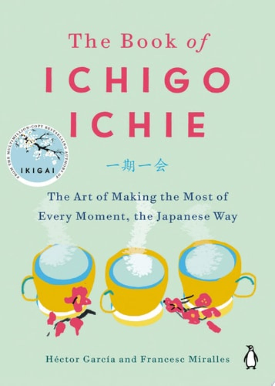 Book cover of 'The Book of Ichigo Ichie' with three yellow teacups and cherry blossoms on a light green background.