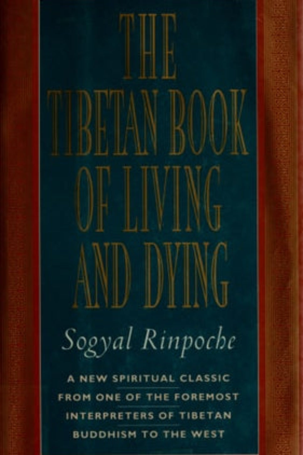 Book cover of 'The Tibetan Book of Living and Dying' by Sogyal Rinpoche with a dark blue background and gold text.