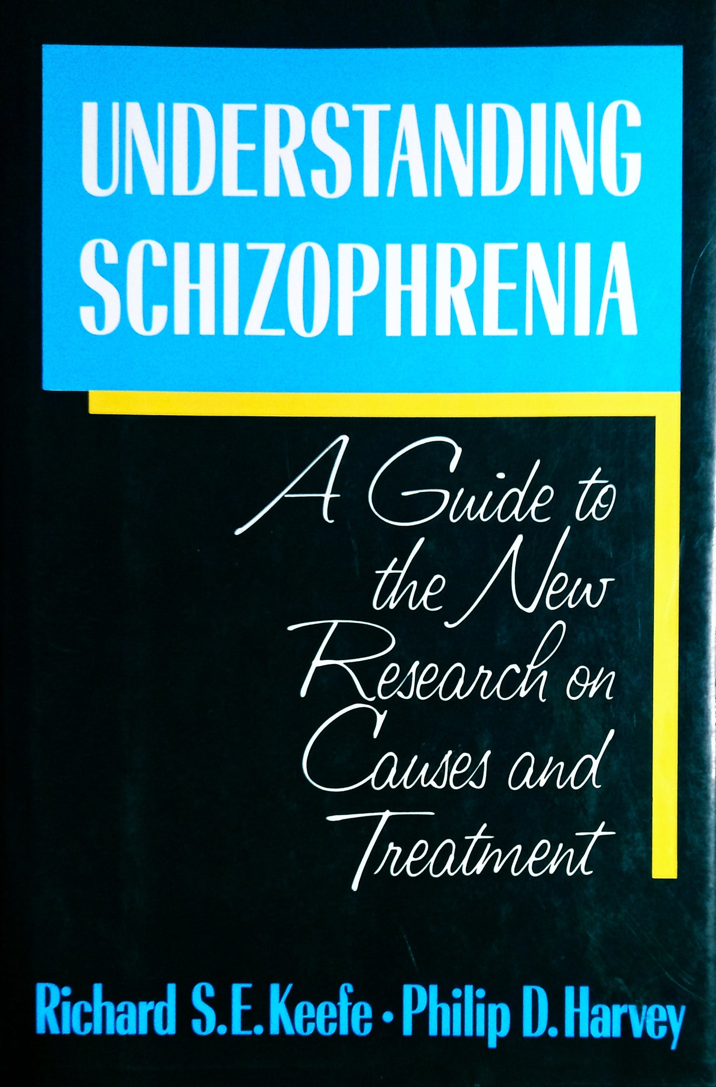 Front book cover of the textbook "Understanding Schizophrenia: A Guide to the New Research on Causes and Treatment" by Richard Keefe, Philip D. Harvey.