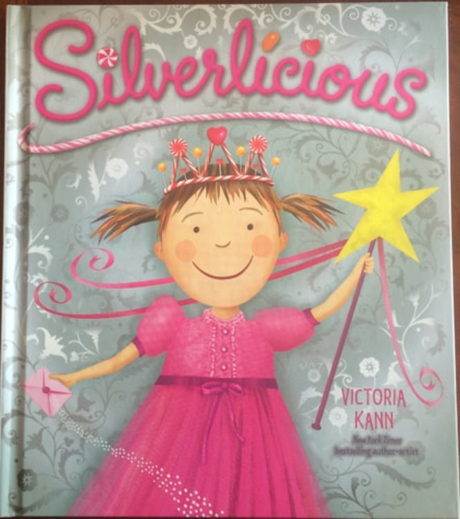 Cover of the book 'Silverlicious' featuring an illustration of a young girl with a pink dress and a crown, holding a star and a note, with decorative elements and a magical aesthetic.