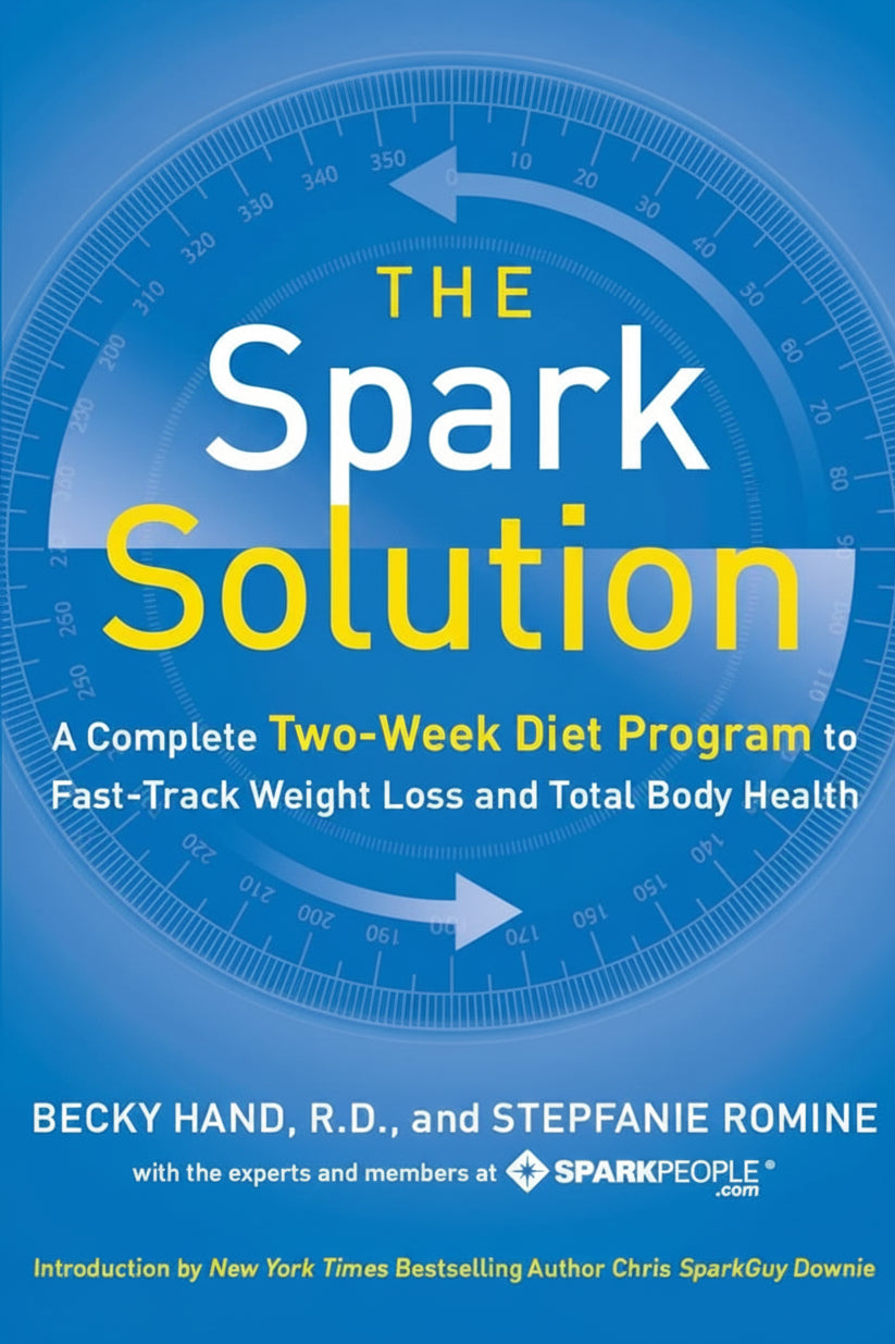 Book cover of 'The Spark Solution' with blue background and circular design