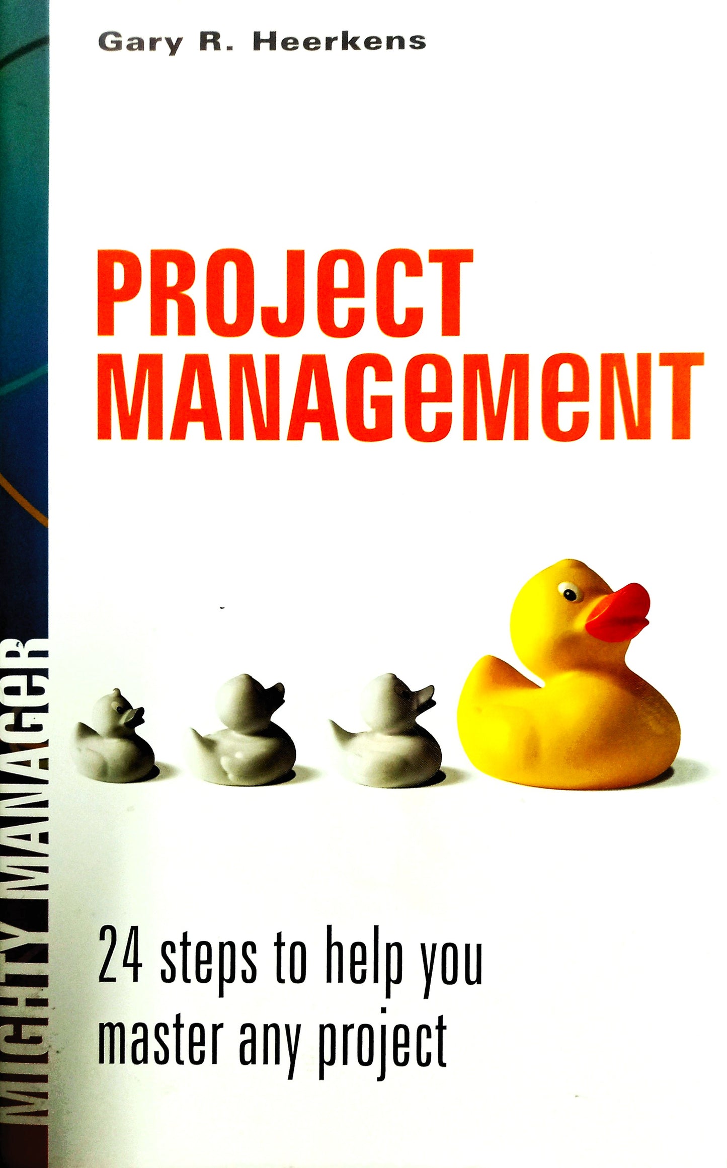The cover of the book 'Project Management: 24 Steps to Help You Master Any Project' by Gary R. Heerkens, featuring a yellow rubber duck leading three grey mice, with the subtitle '24 steps to help you master any project'.
