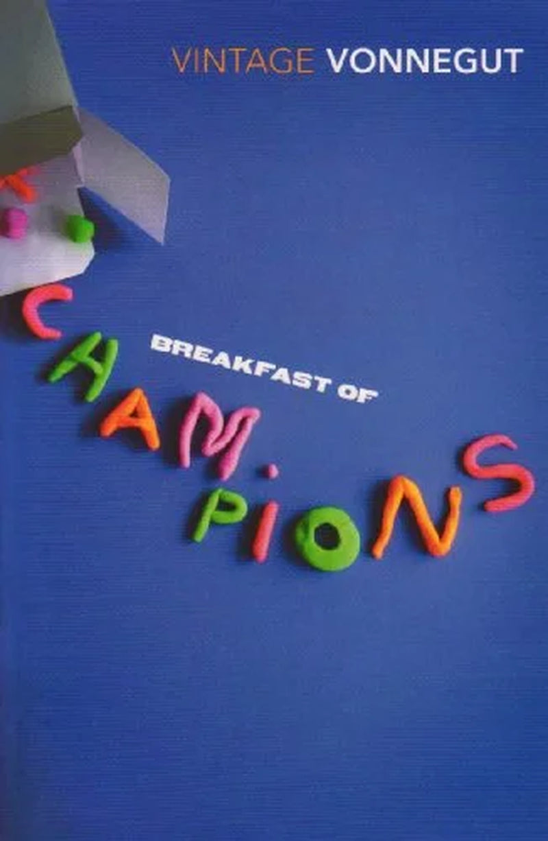 The image shows the cover of the book 'Breakfast of Champions' by Kurt Vonnegut. The cover features a blue background with the title text in bold, colorful letters, and a graphic design with letters spelling out 'CHAMPIONS' in a visually appealing way.