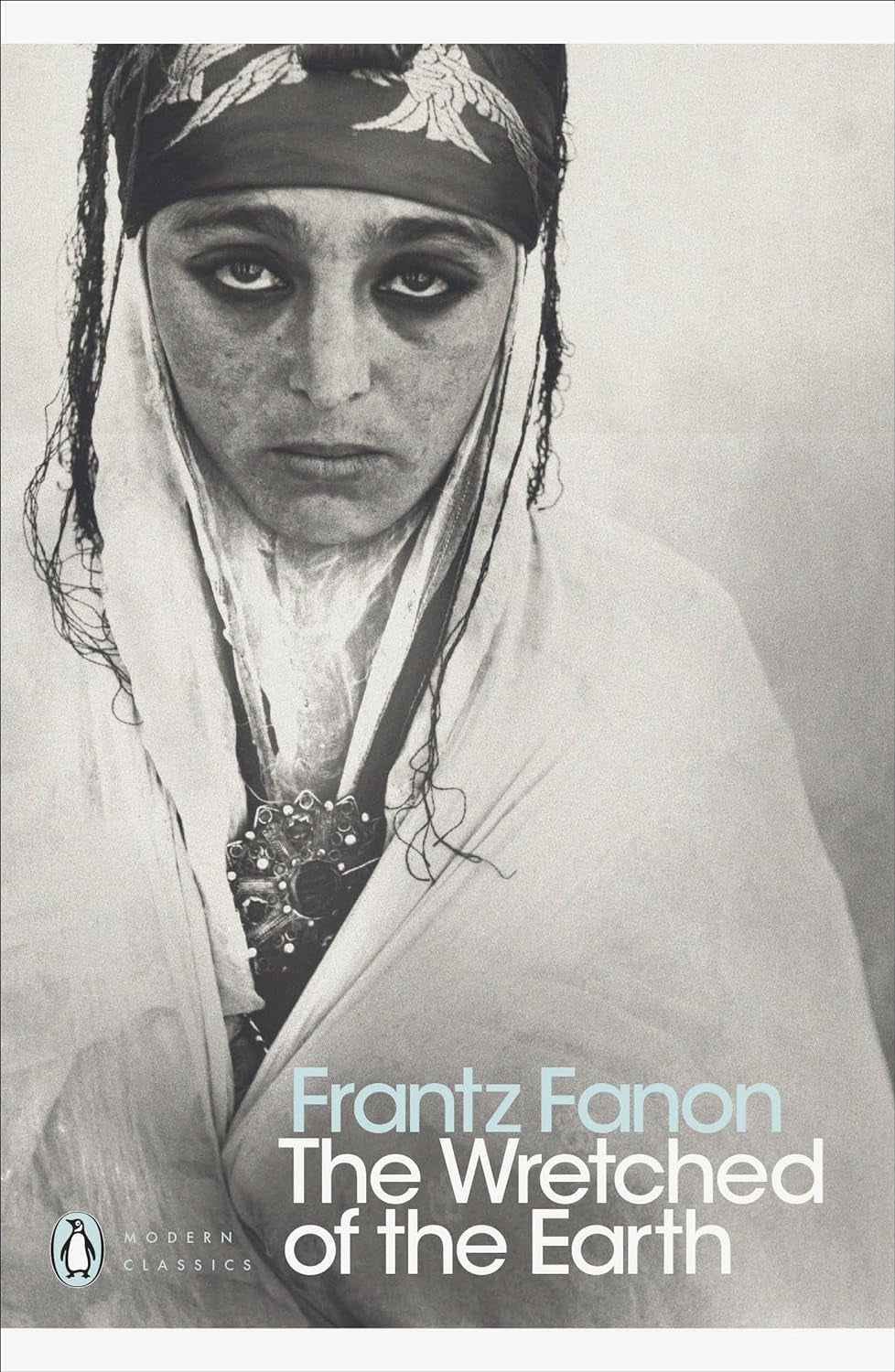 Book front cover of 'The Wretched of the Earth' by Frantz Fanon.
