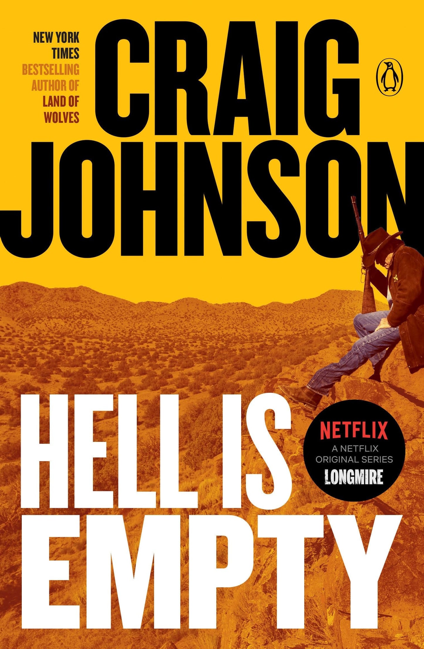 Book cover of 'Hell is Empty' by Craig Johnson with a desert scene and a person on horseback.