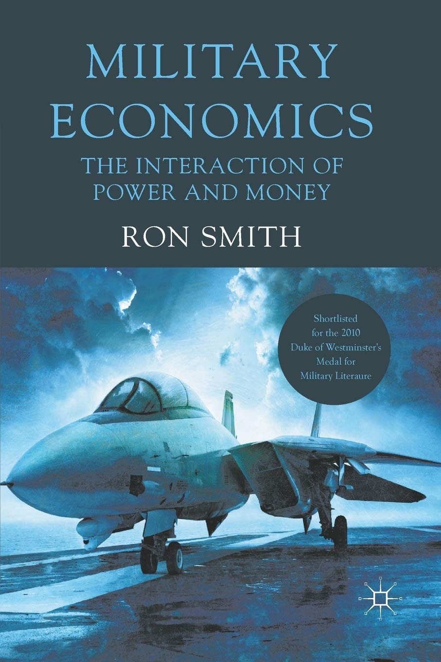 Book cover of 'Military Economics' by Ron Smith with a fighter jet on a runway.