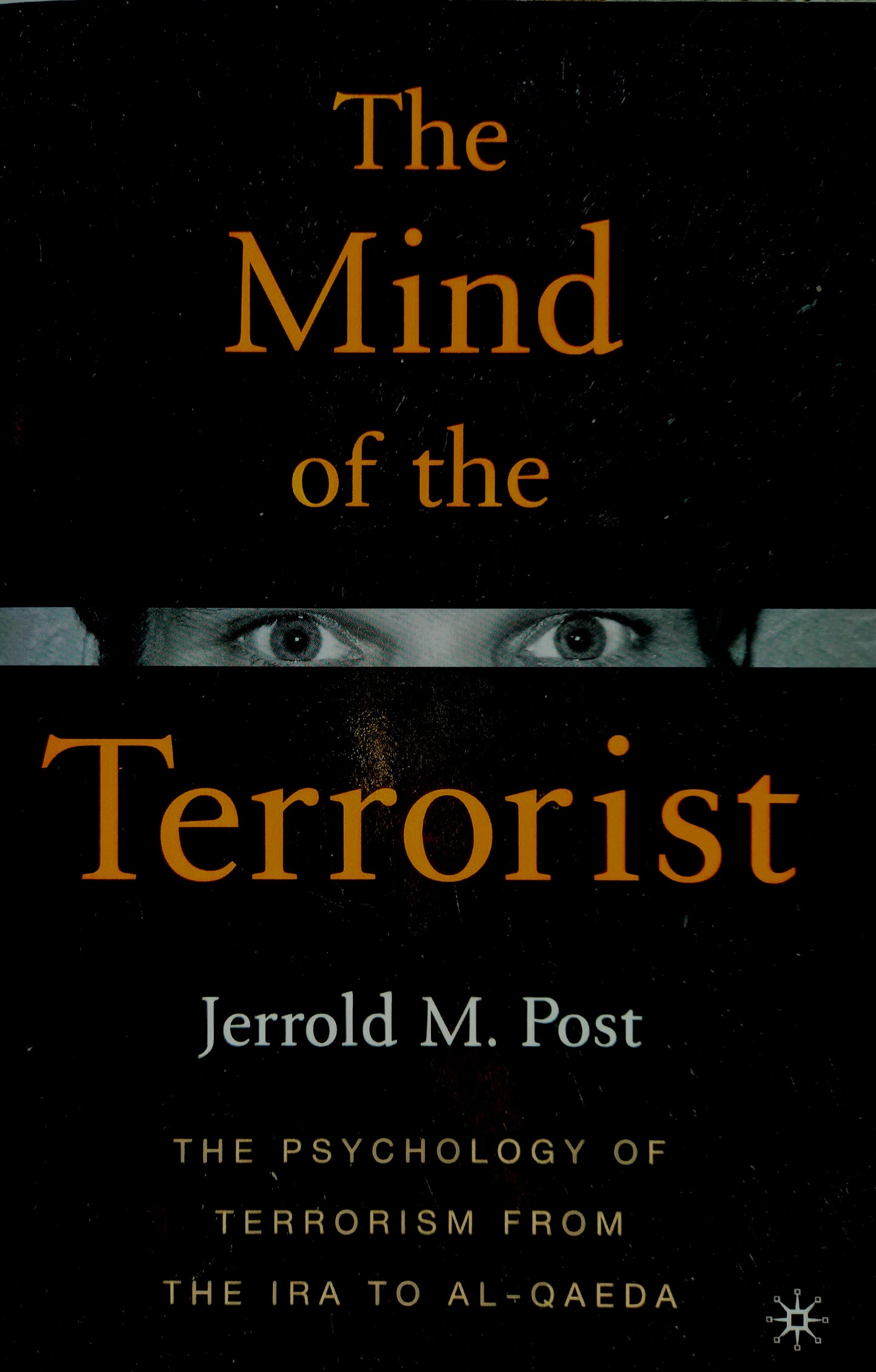 This image features the cover of the book titled "The Mind of the Terrorist: The Psychology of Terrorism from the IRA to Al-Qaeda" by Jerrold M. Post.