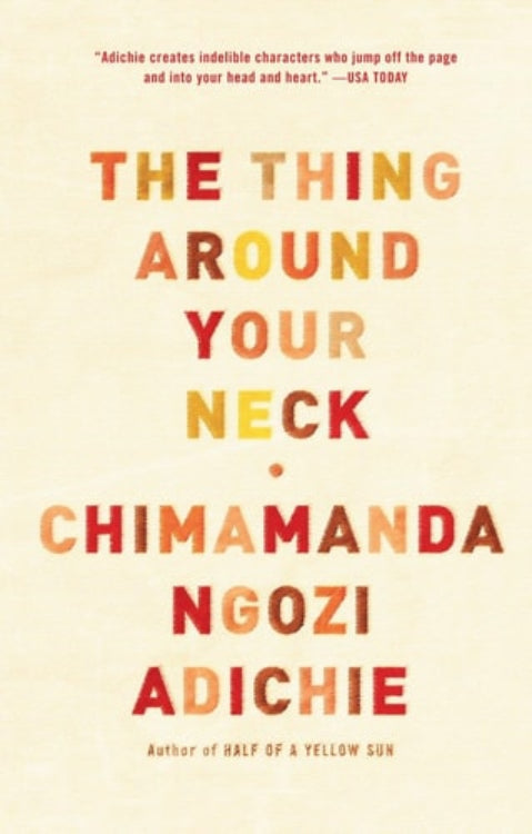 This image displays the cover of the book "The Thing Around Your Neck" by Chimamanda Ngozi Adichie. The book's title is presented in bold, warm yellow letters against a soft beige background, which gives a clean and minimalist look.
