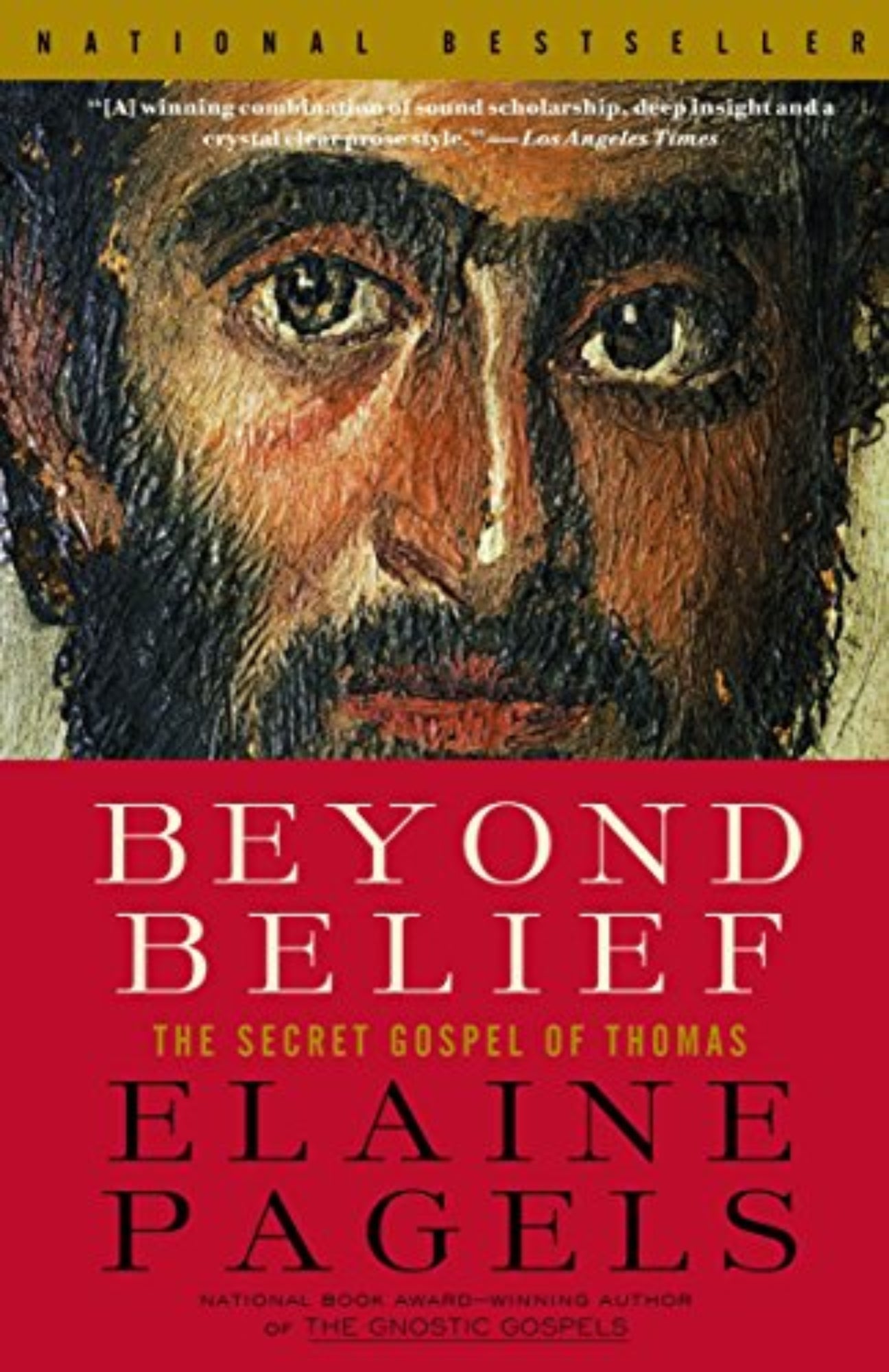 This image features the cover of the book "Beyond Belief: The Secret Gospel of Thomas" by Elaine Pagels. The cover design is straightforward yet compelling, with a bold red background that contrasts with a large, intense portrait of a man's face in the foreground.