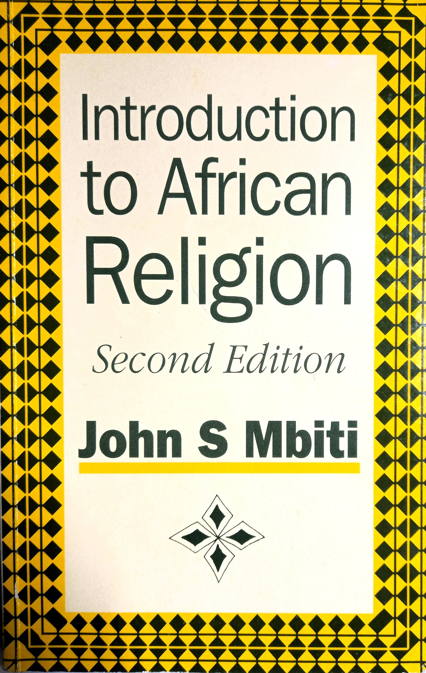 The cover of the book 'Introduction to African Religion' by John S. Mbiti, featuring a title and author name on a background with a geometric pattern.