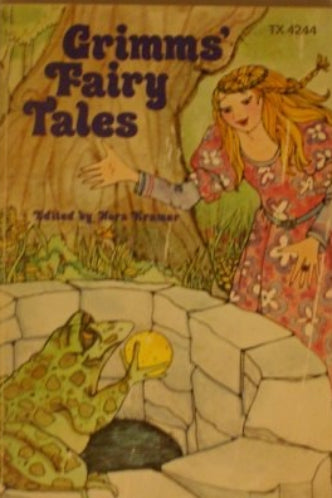 Book cover of 'Grimm's Fairy Tales' with illustrations of a fairy and frog by a well.