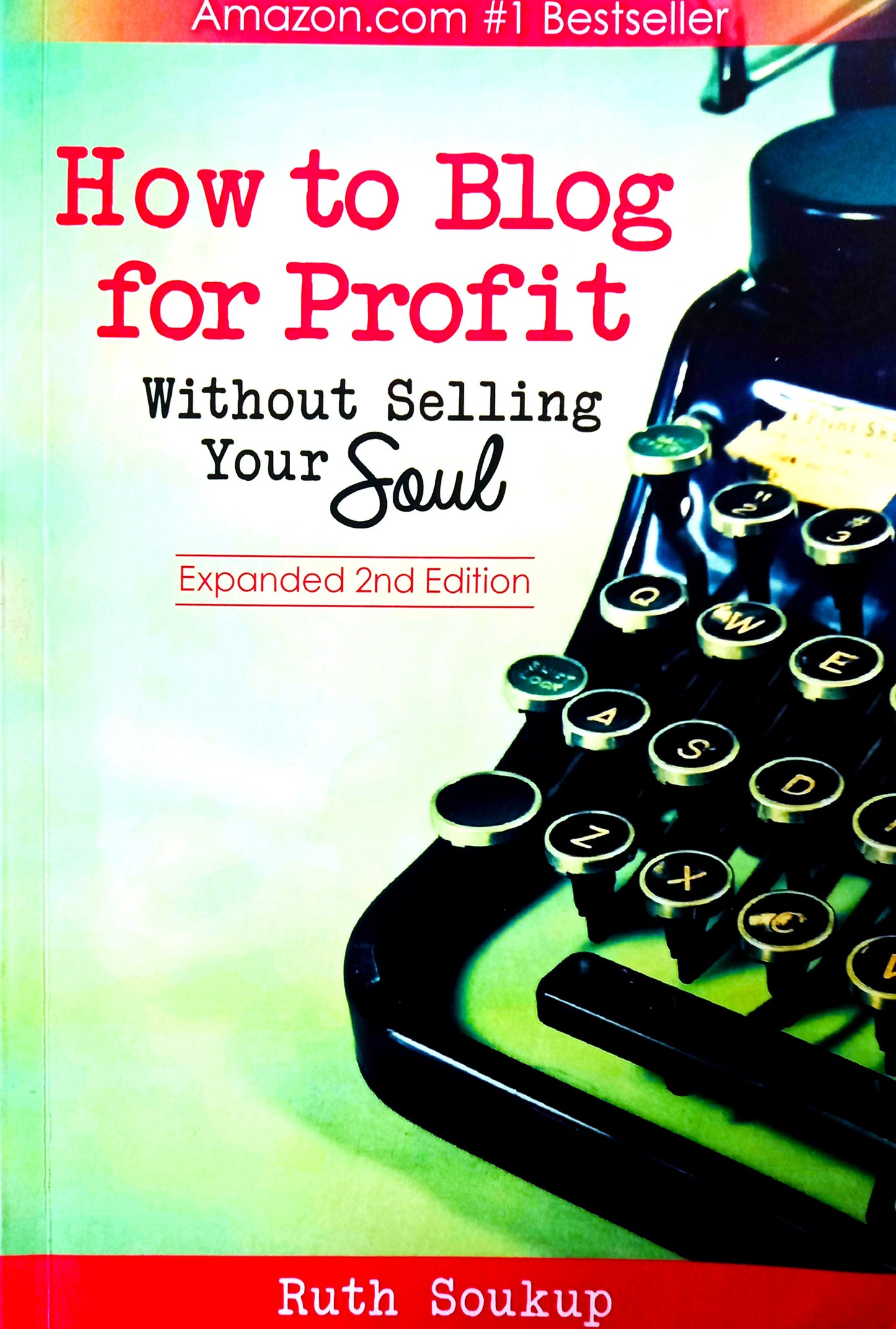 The cover of the book 'How to Blog for Profit: Without Selling Your Soul' by Ruth Soukup features a vintage typewriter. The book is listed as the #1 Bestseller in its category on Amazon.