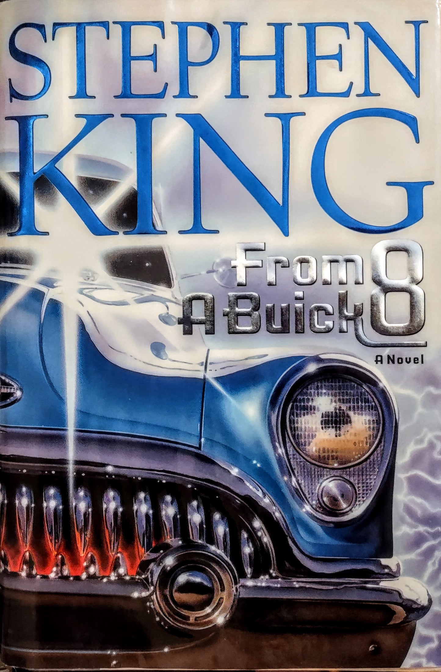 Book cover of 'From a Buick 8' by Stephen King featuring a vintage car.