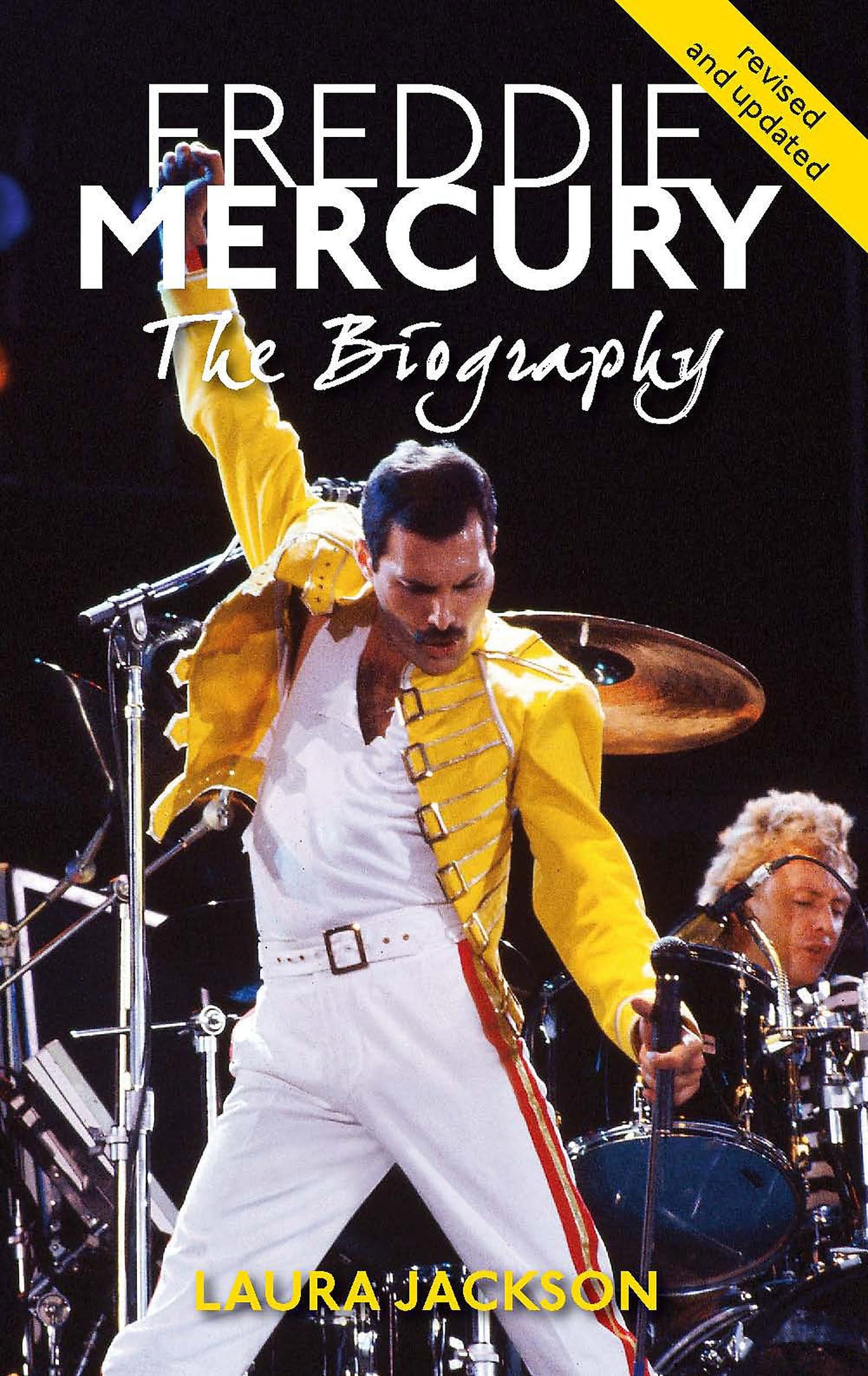Book cover of 'Freddie Mercury: The Biography' with a performer in a yellow Freddie Mercury outfit on stage.