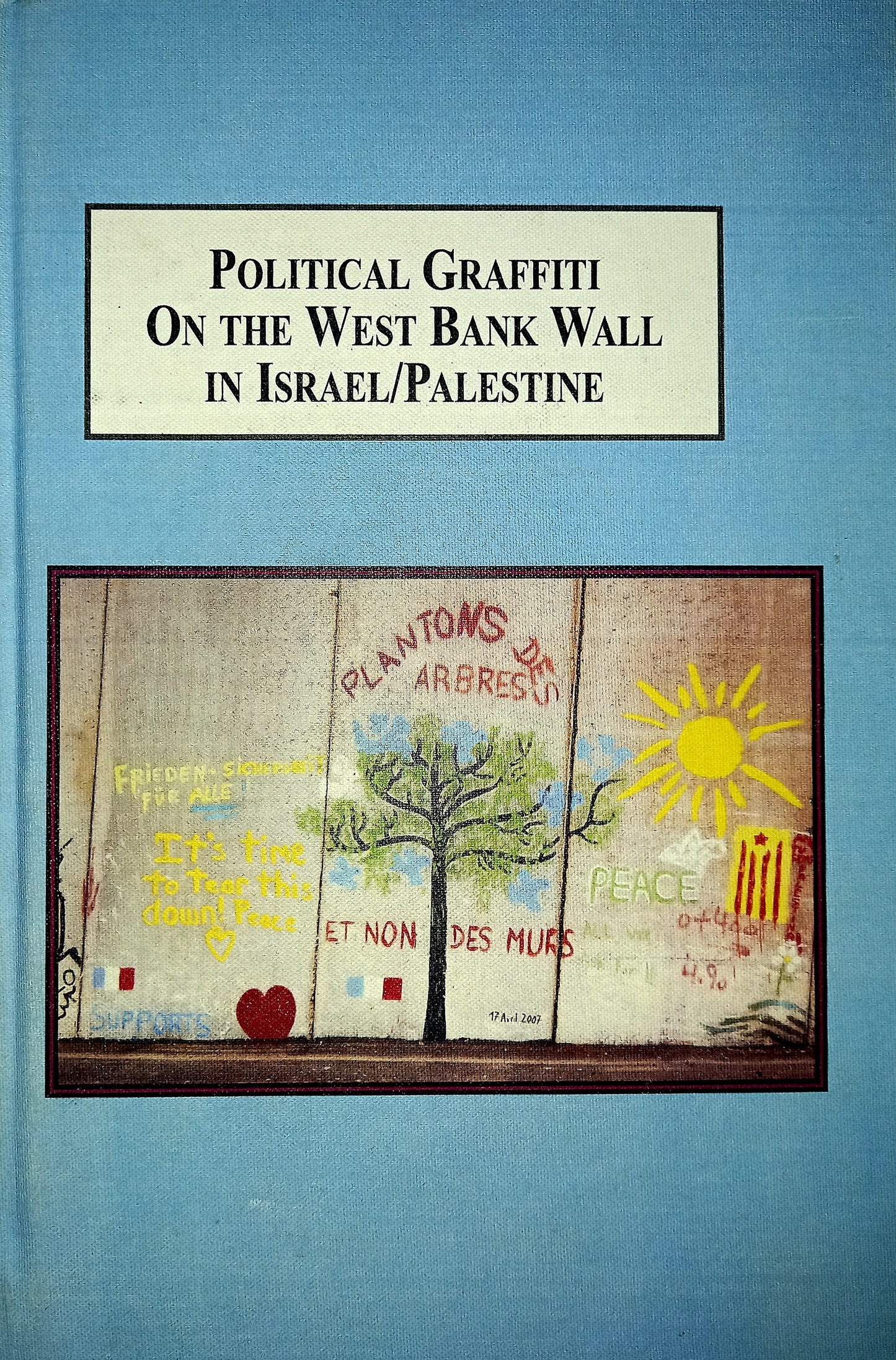 This image features the cover of the book titled "Political Graffiti on the West Bank Wall in Israel/Palestine" by Dr. Steven Olberg.