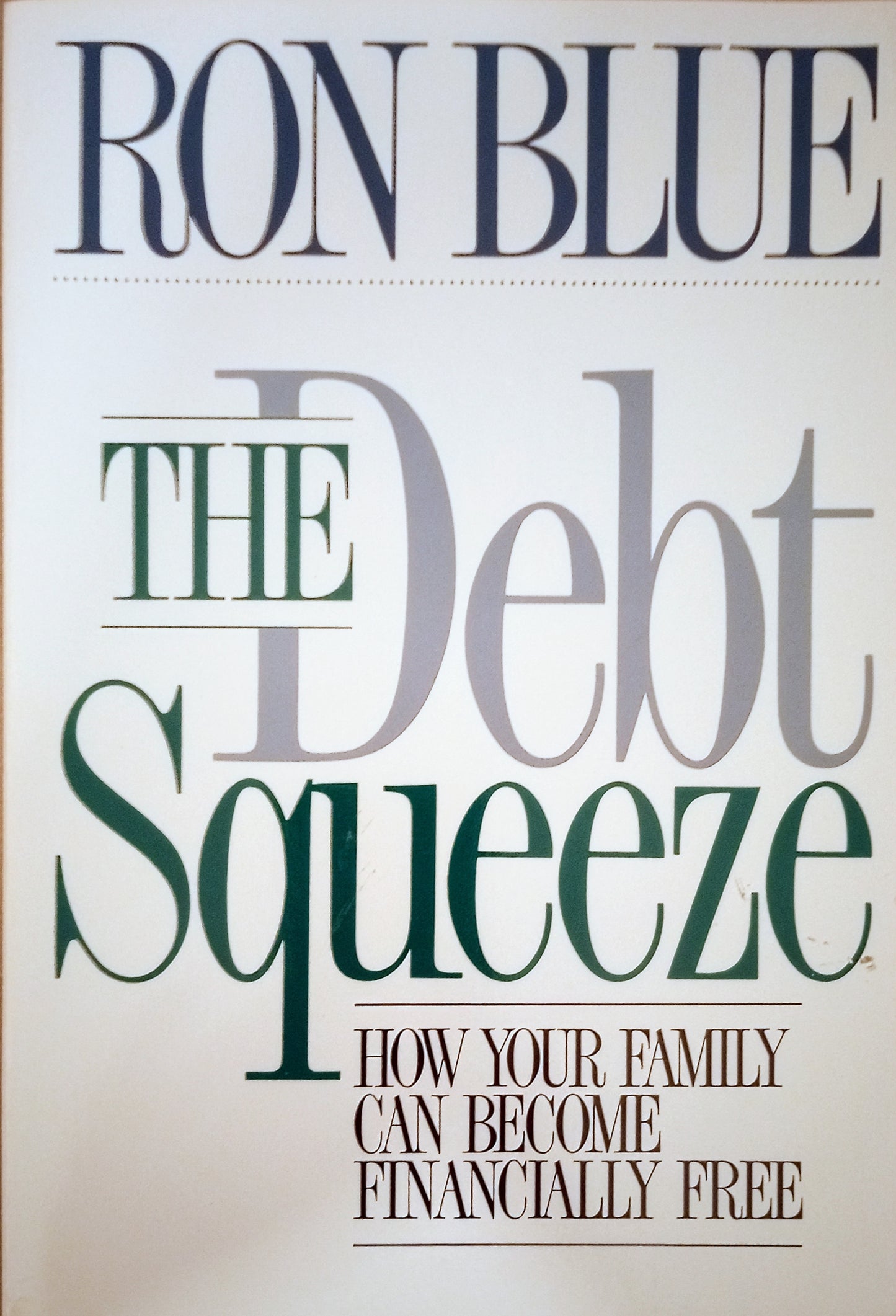 The image displays the cover of a book titled "The Debt Squeeze" by Ron Blue. The cover features a simple, elegant design with dark and light green text.