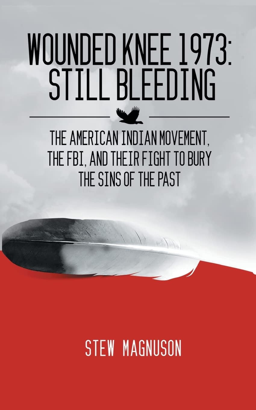 Book front cover of 'Wounded Knee 1973: Still Bleeding: the American Indian Movement, the FBI, and Their Fight to Bury the Sins of the Past' by Stew Magnuson with a red, white and black cover and a single feather across the center.