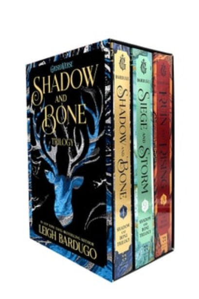 A boxed set of three books from the Shadow and Bone Trilogy by Leigh Bardugo, featuring covers with a deer motif and a blue and green color scheme.