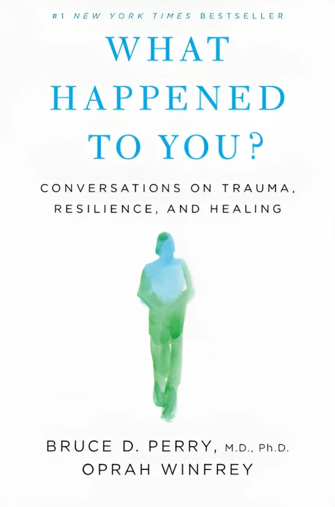 Cover of the book 'What Happened to You?' featuring Oprah Winfrey and a graphic of a person silhouetted against a blue background.