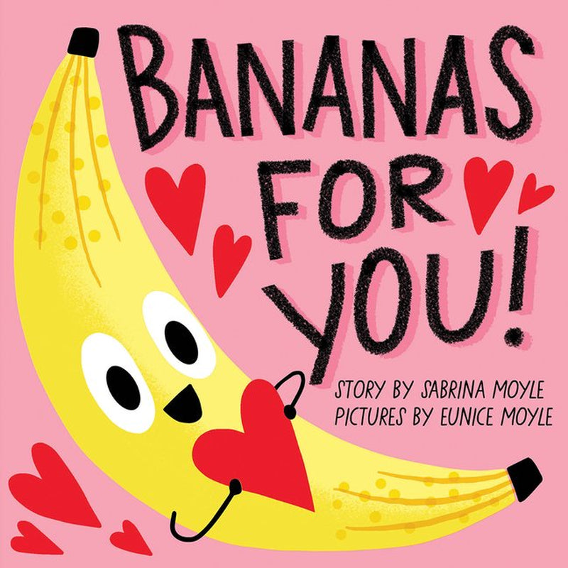 Book front cover of the baby board book "Bananas for You! A Board Book" by Sabrina Moyle, Eunice Moyle and Hello!Lucky. Book cover features a smiling banana holding a valentines day heart and hearts around the title and author/illustrator text over a pink background.