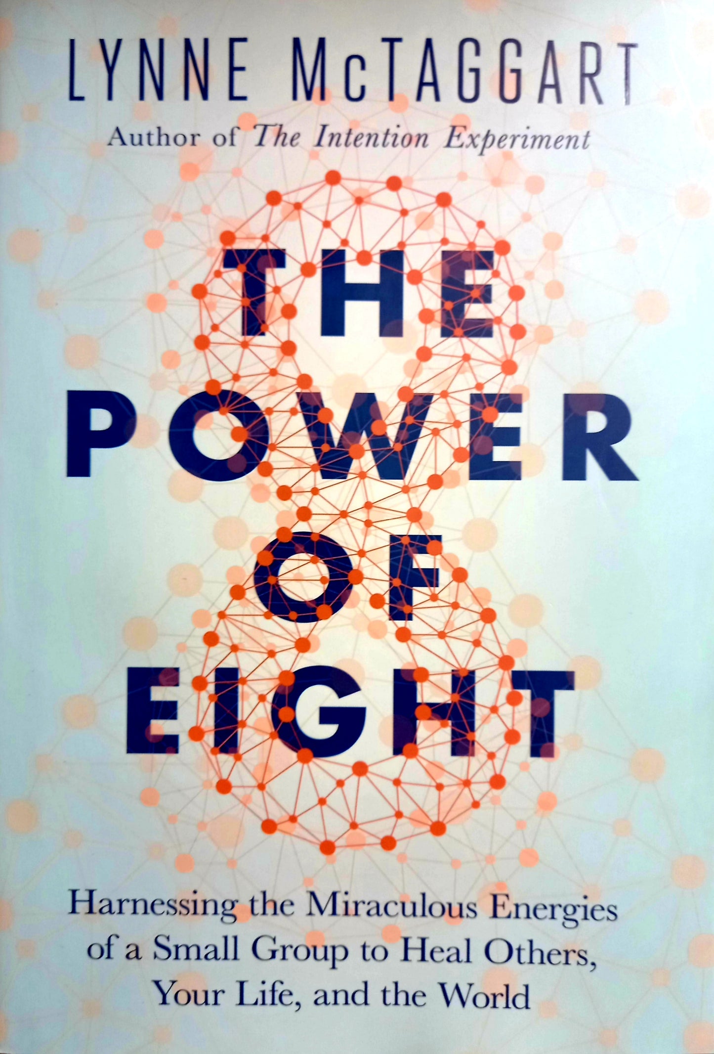 Book cover for 'The Power of Eight' featuring a stylized graphic design with abstract shapes in blue and orange tones, and the title prominently displayed.