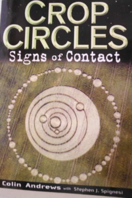 Book cover of 'Crop Circles: Signs of Contact' by Colin Andrews with a crop circle design on the cover.