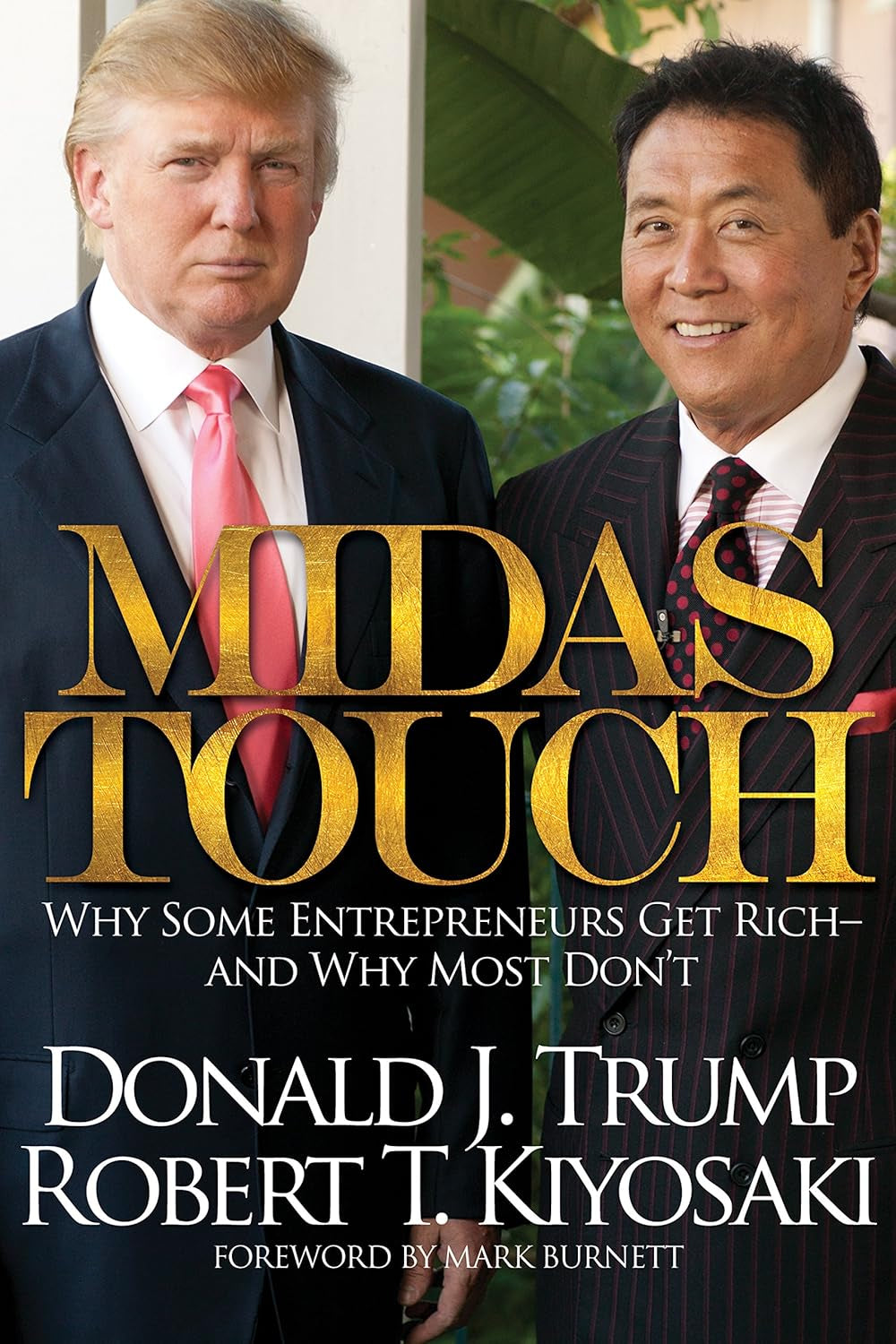 Cover of the book 'Midas Touch: Why Some Entrepreneurs Get Rich—and Why Most Don't' by Donald J. Trump and Robert T. Kiyosaki, featuring both men standing next to each other in suits.
