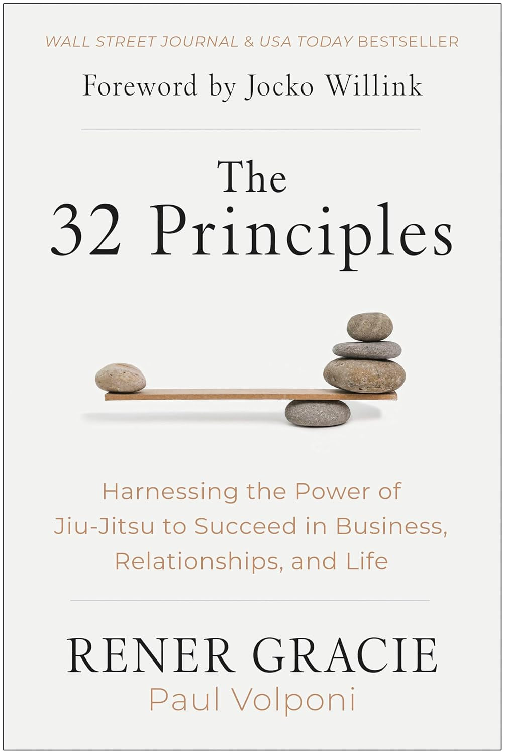 The cover of the book 'The 32 Principles' by Rener Gracie and Paul Volponi, featuring a title text and a visual of a stack of pebbles on a scale, symbolizing balance.