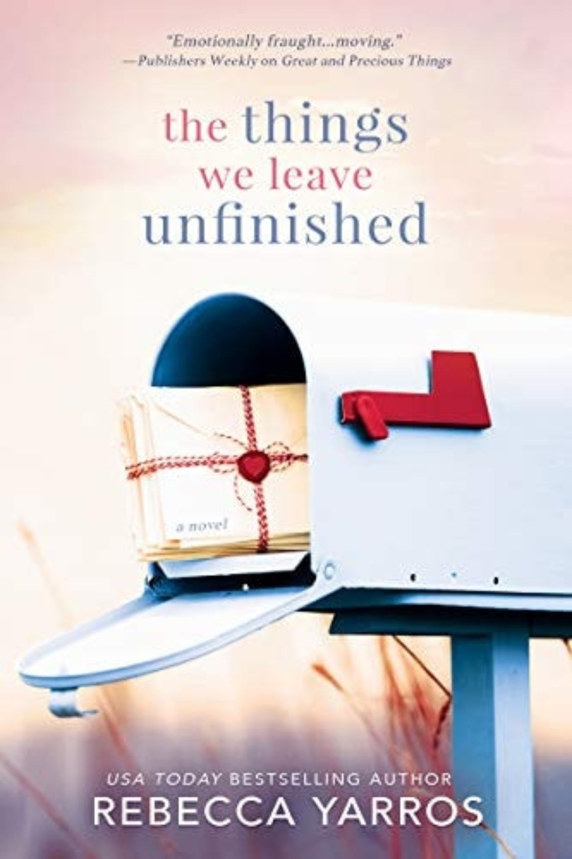 Book front cover image of "The Things We Leave Unfinished." The cover features a mailbox with a red flag raised, with a soft-focused background.