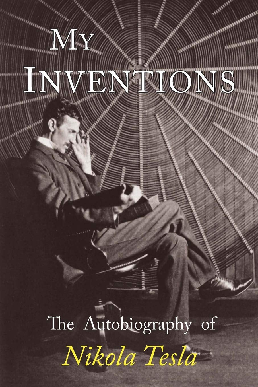 Book cover of 'My Inventions: The Autobiography of Nikola Tesla' showing a portrait of Nikola Tesla with a spider web background.
