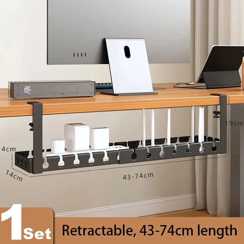 Retractable desk organizer on a wooden desk with electronic devices.