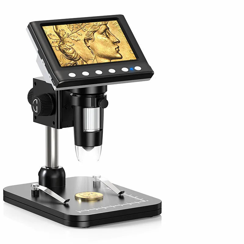 Digital microscope with screen displaying an image of a gold coin and face, on a white background.