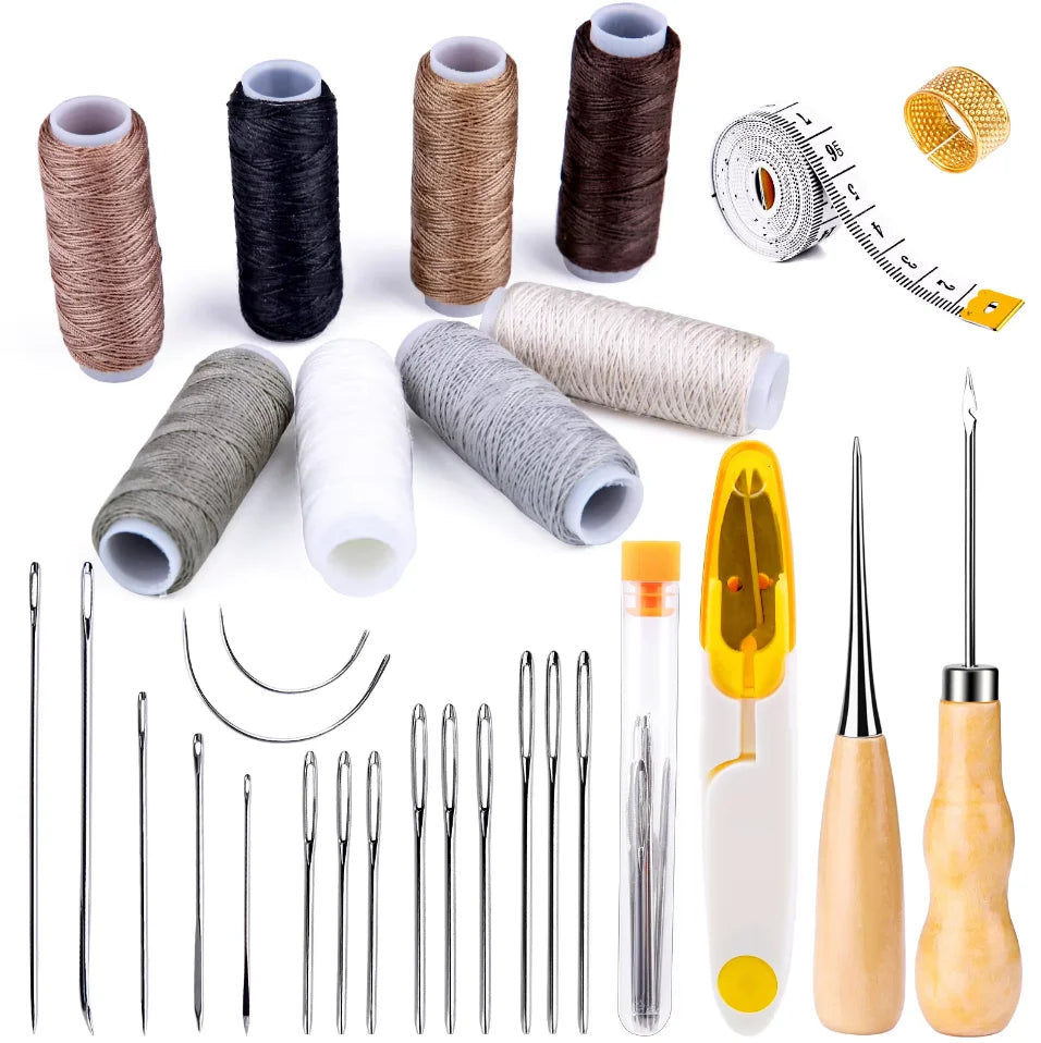 Set of sewing threads and tools including needles and a measuring tape for bookbinding and DIY book creation making on a white background.