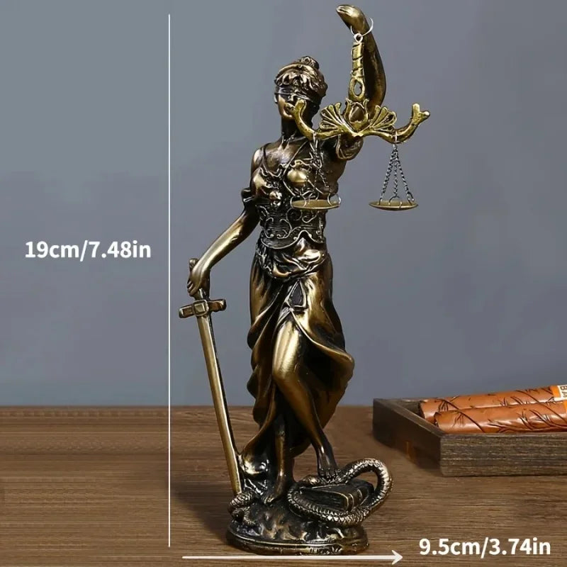Statue of Lady Justice with measurements on a wooden surface