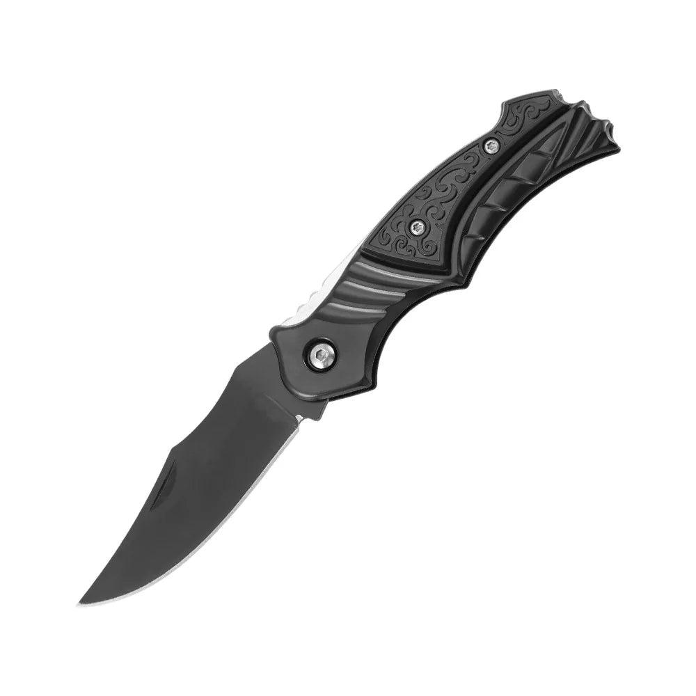 Black folding knife with textured handle on a white background