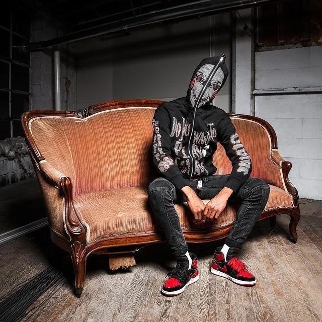 Jigsaw hoodie full-zip mask from Saw with rhinestone graphics and horror design and Back of hoodie with Game Over buzzsaw design from Saw movie franchise