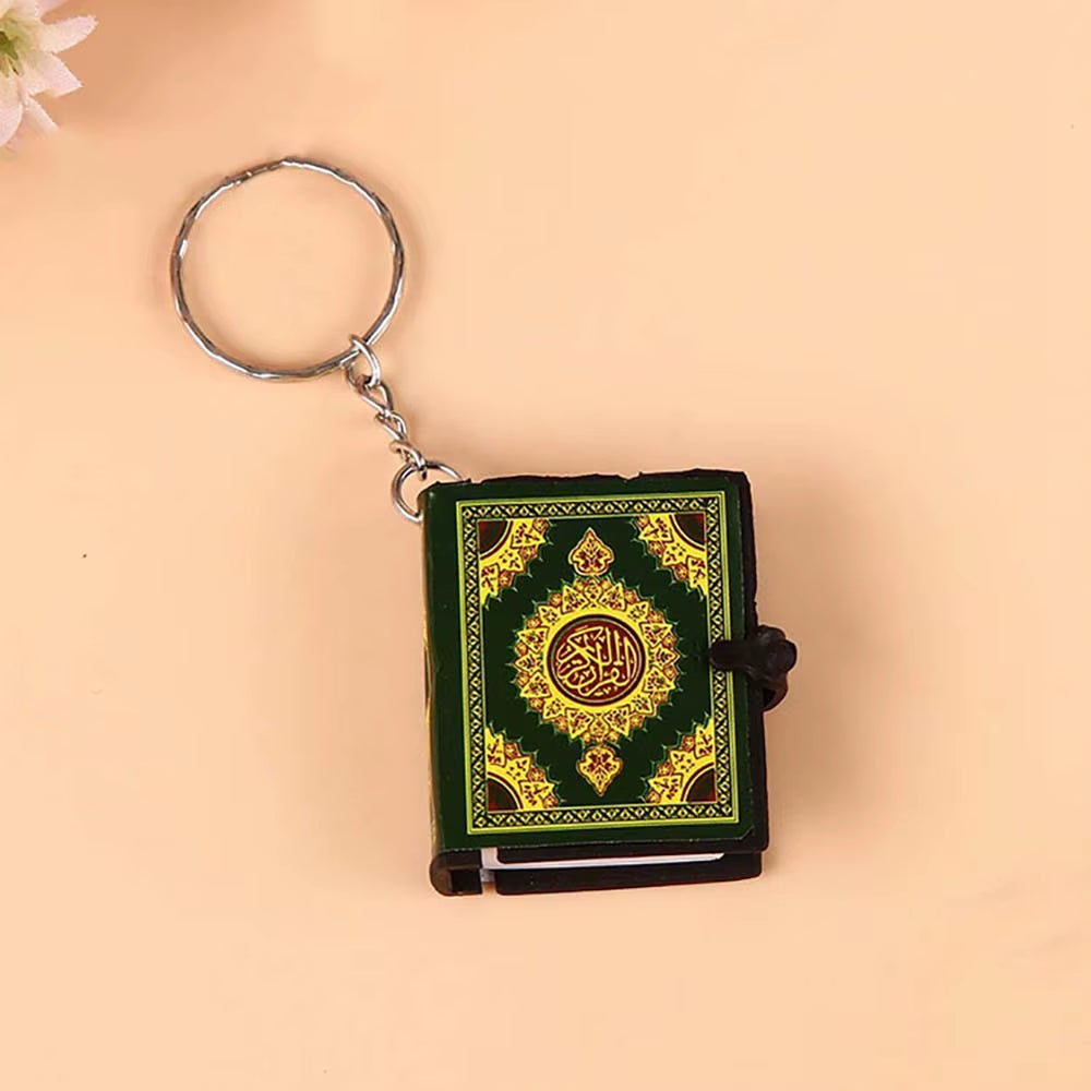 Keychain Qur’an laid flat on table