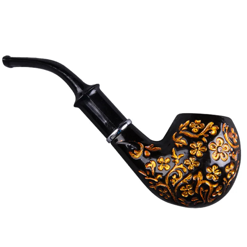 Decorative black briar pipe with gold floral patterns on a white background