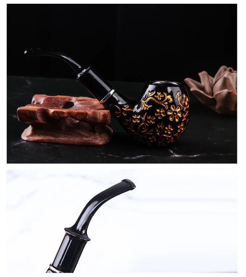 Decorative smoking pipe with intricate design on a dark surface