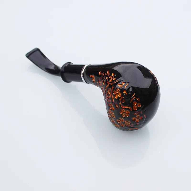 Decorative black and brown pipe on a light gray background