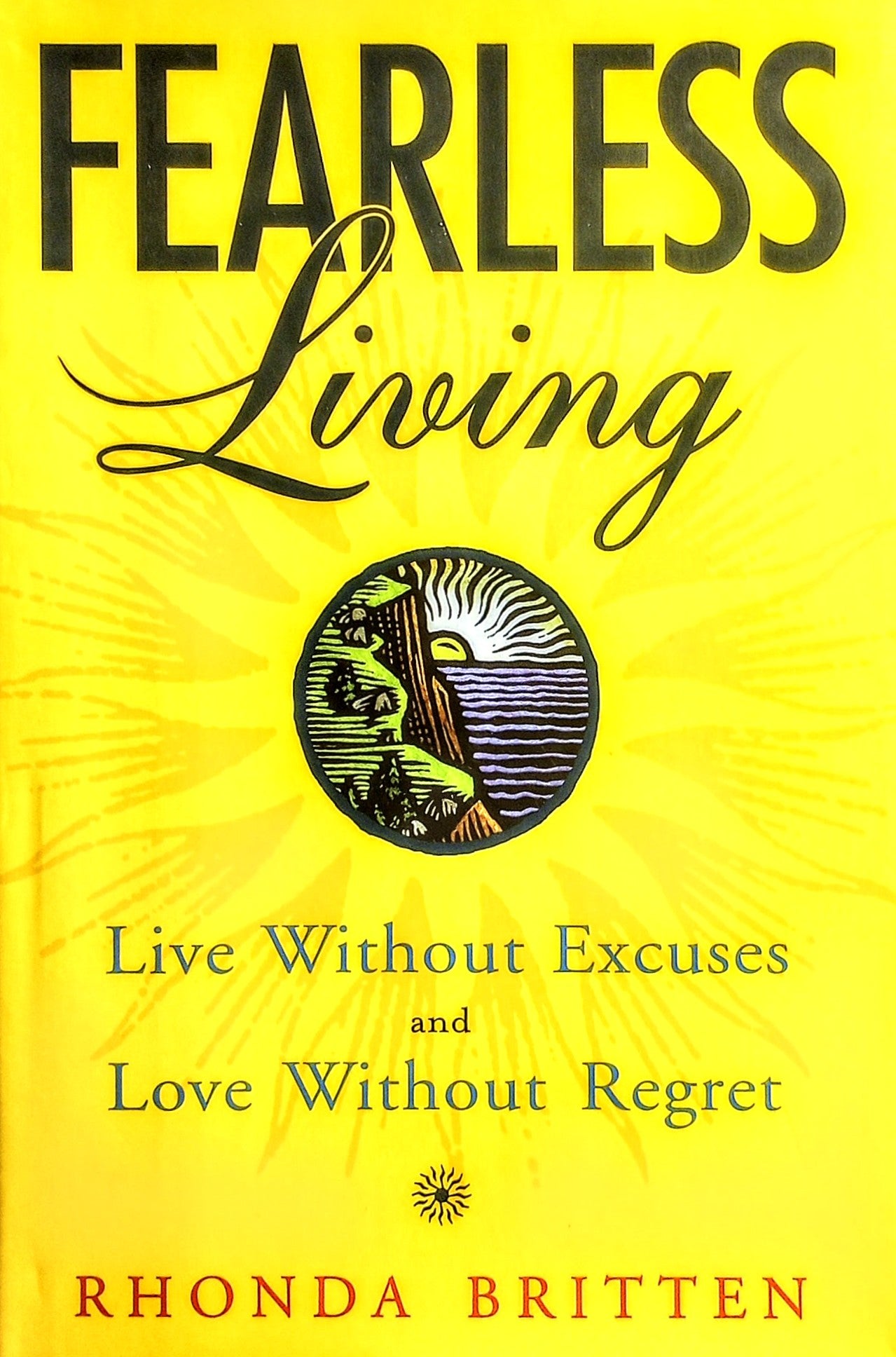 Book cover of 'Fearless Living' by Rhonda Britten with a yellow background and circular design.