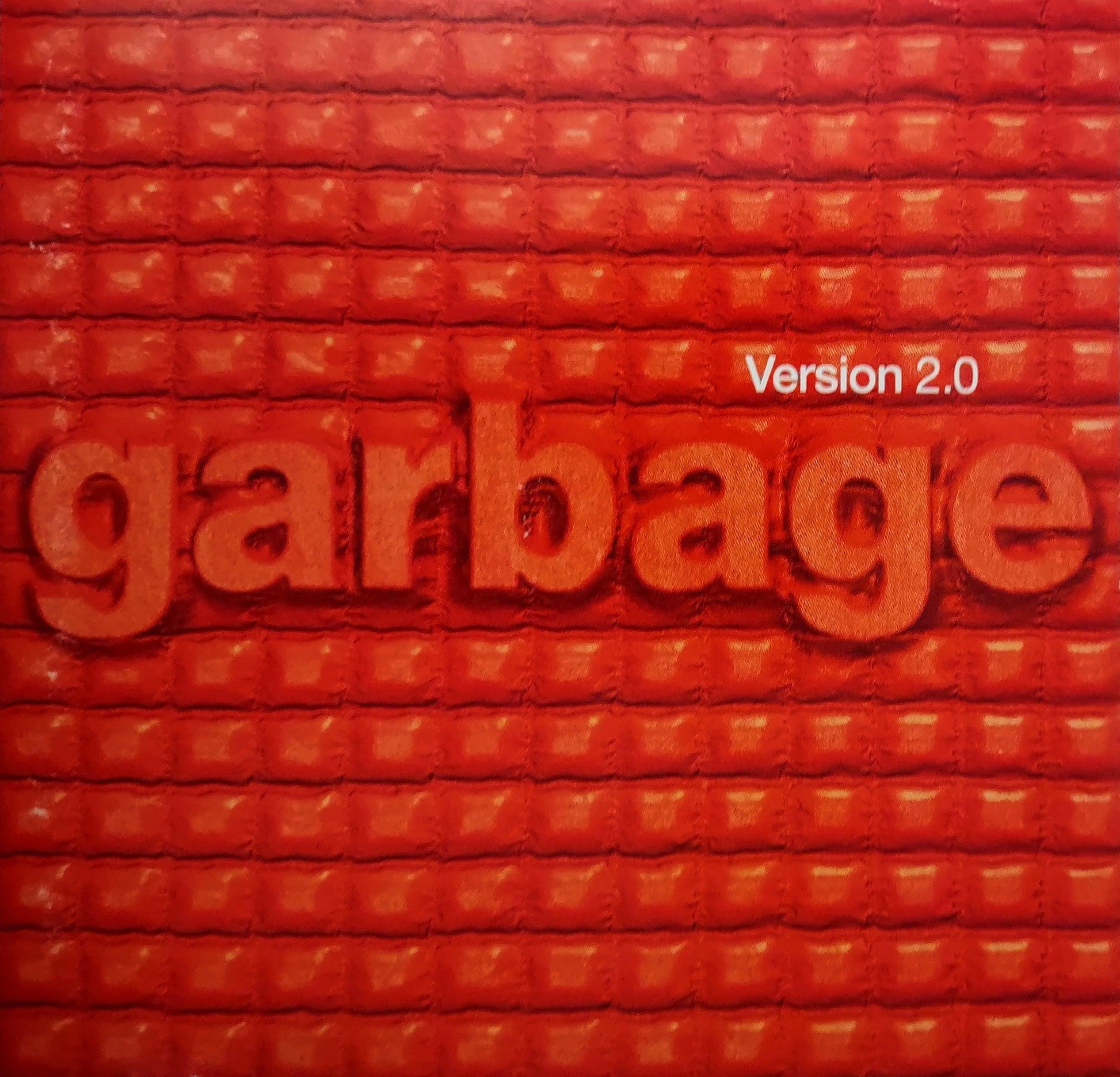 Album cover with 'garbage' and 'Version 2.0' text on a textured red background