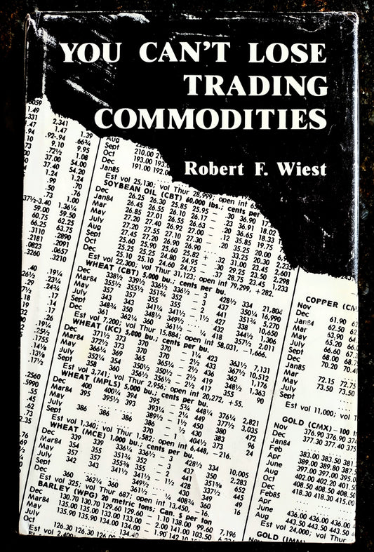 Book cover of 'You Can't Lose Trading Commodities' by Robert F. Wiest with a black and white price list.