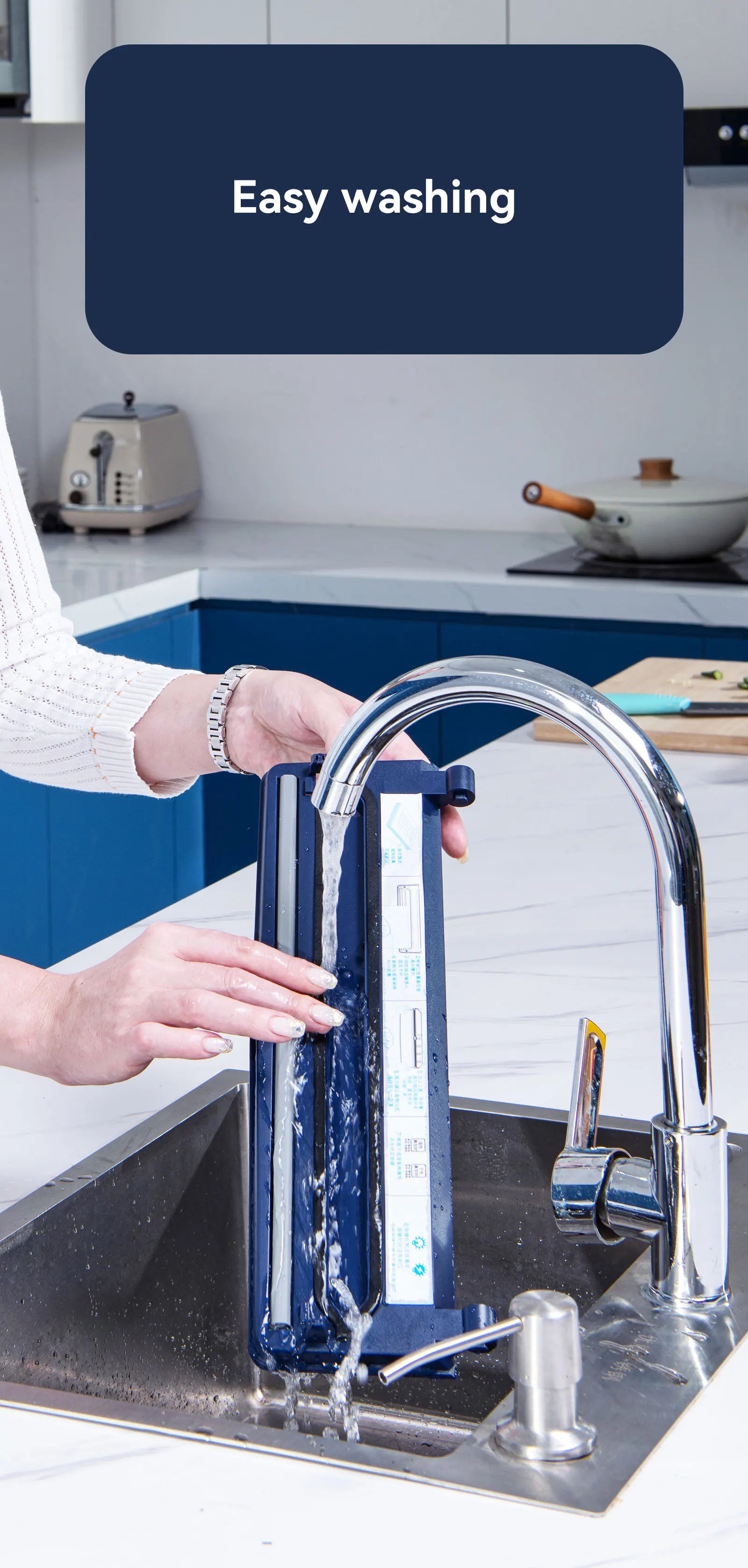 Person washing a Sleek 135W LED vacuum sealer machine for household kitchen food storage in a kitchen sink with a faucet labeled 'Easy washing'.