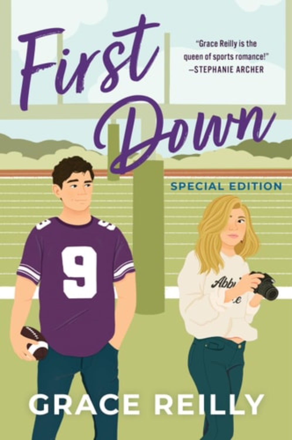Book cover of 'First Down' by Grace Reilly featuring a football player and a photographer on a sports field.