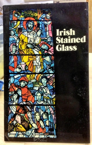 Book cover with stained glass design and text 'Irish Stained Glass' on a black background