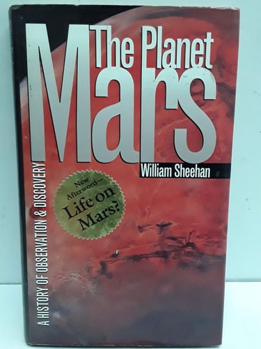 Book cover of 'The Planet Mars' by William Sheehan with a red and black design.